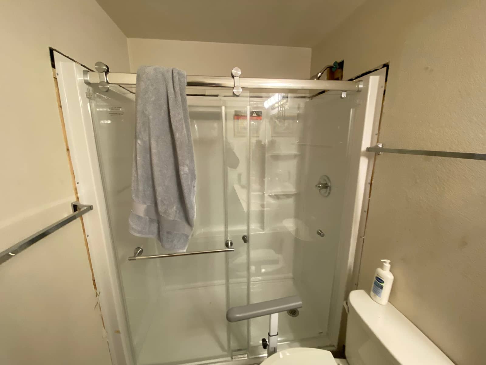Completed shower surround installation by Andy's Plumbing & Drain