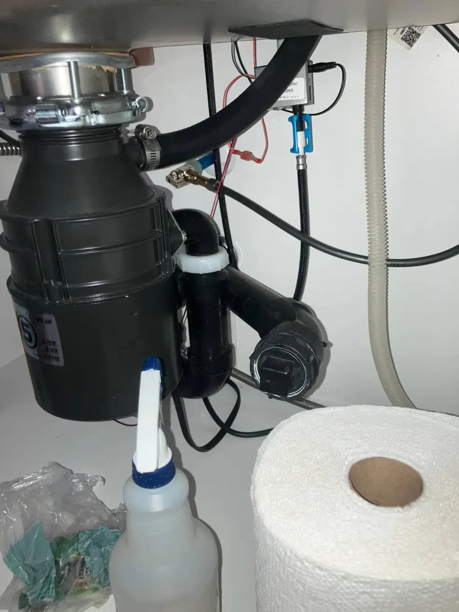 Garbage disposal and drain plumbing installed by Andy's Plumbing & Drain