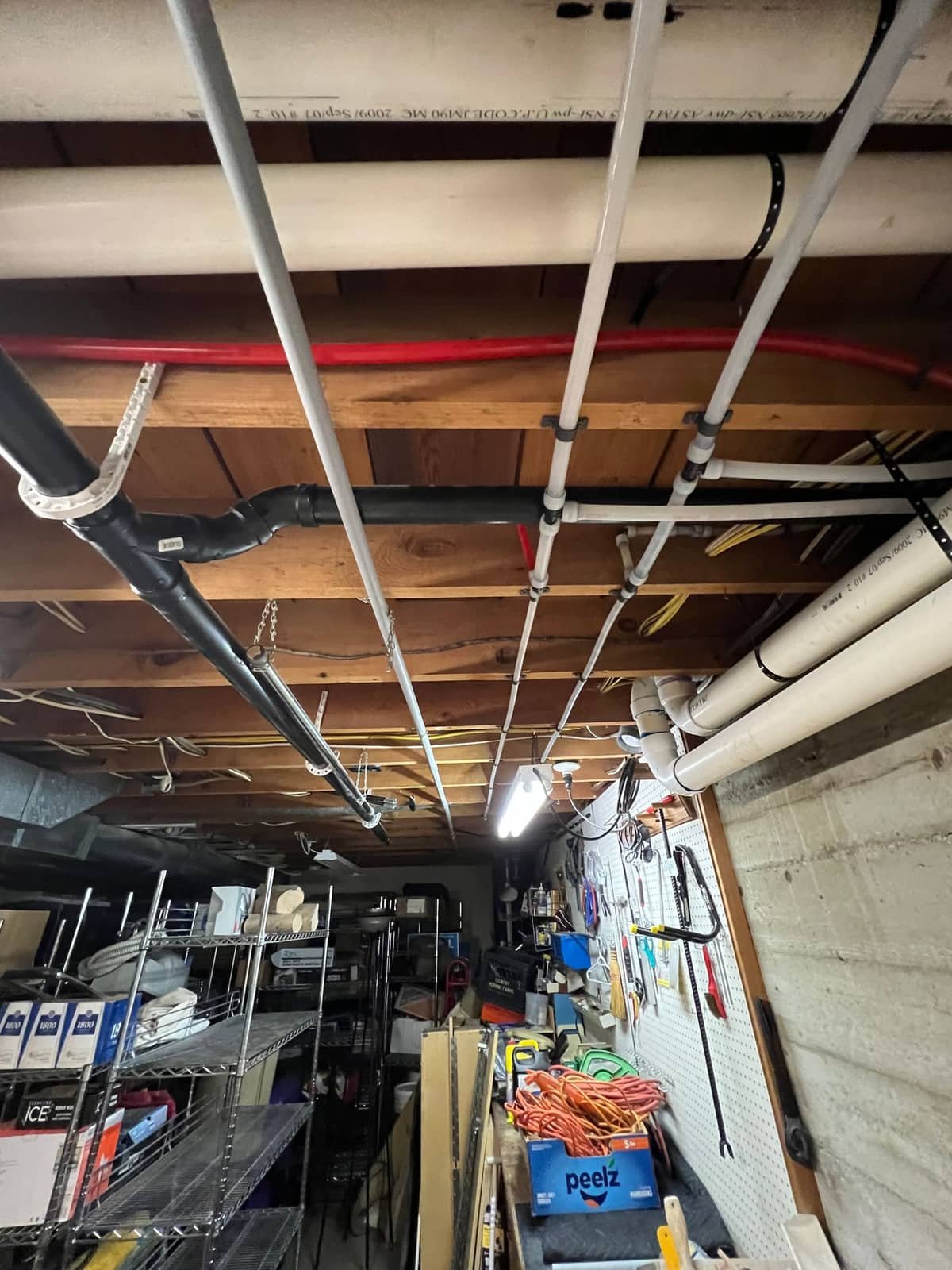 PEX manifold and supply line routing detail from a whole-home repipe