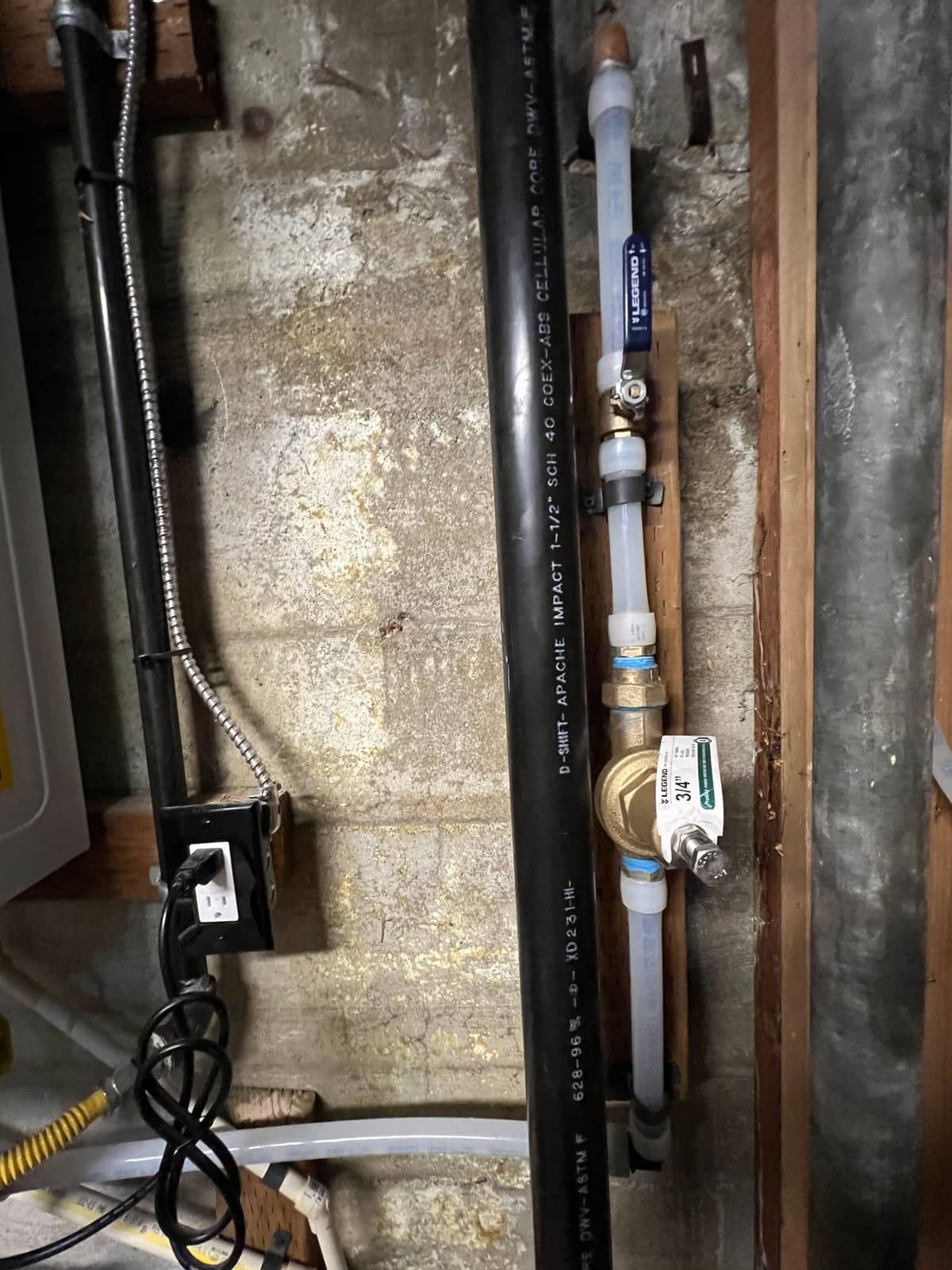 PEX repipe rough-in showing new supply lines run through wall framing