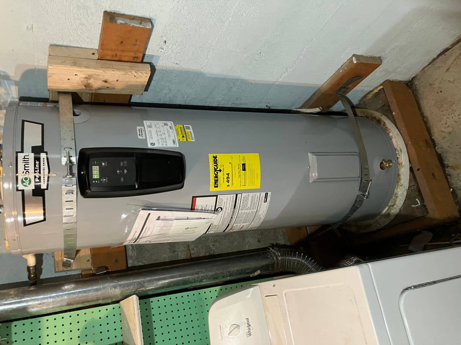 Commercial-grade water heater installed and strapped by Andy's Plumbing & Drain
